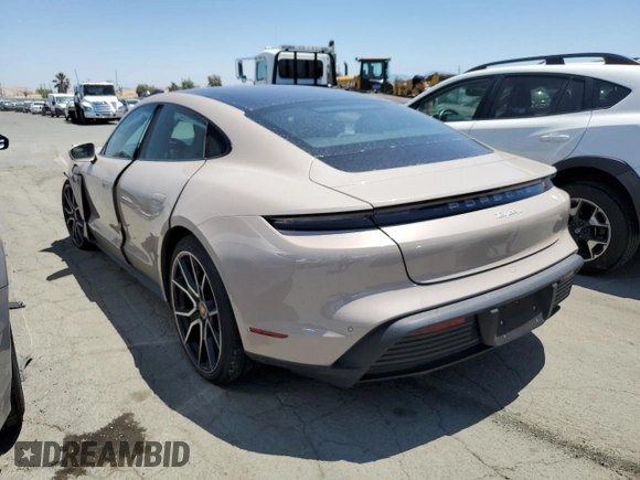 2024 Porsche Taycan z VIN WP0AA2Y1XRSA10095, wystawiony jako Copart lot #60040284 z przebiegiem 1 732 mil mil oraz Szkoda całkowita • Salvage title. Historia ofert i sprzedaży dostępna na DreamBid. Obrazek 2.