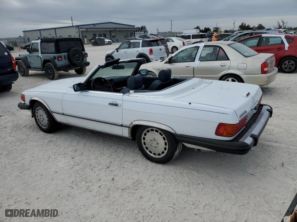 1988 Mercedes-Benz 560 Series 560SL with VIN WDBBA48D3JA086077, listed as a Copart auction lot 77017824 with 169,123 mi miles and Salvage Title. Bid and sale history available at carsss.com. Image 2.