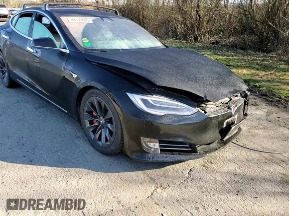 2019 Tesla Model S 100D с VIN 5YJSA1E45KF330891, выставлен на аукционе Copart как лот 48133005 с пробегом 53 018 миль миль и Списание • Salvage title. История ставок и продаж доступна на DreamBid. Изображение 11.