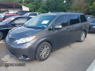 2015 Toyota Sienna XLE with VIN 5TDYK3DC6FS542504, listed as a IAAI auction lot 42569992 with 113,004 mi miles and . Bid and sale history available at DreamBid. Image 17.