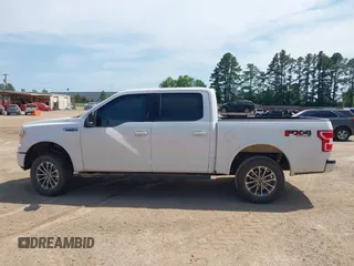 2020 Ford F-150 XL with VIN 1FTEW1E59LKE78957, listed as a IAAI auction lot 42021245 with 92,322 mi miles and . Bid and sale history available at DreamBid. Image 14.