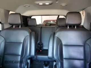 2018 Chevrolet Traverse Premier z VIN 1GNEVJKW9JJ261483, wystawiony jako Copart lot #50180235 z przebiegiem 97 537 mil mil oraz Szkoda całkowita • Salvage title. Historia ofert i sprzedaży dostępna na DreamBid. Obrazek 10.