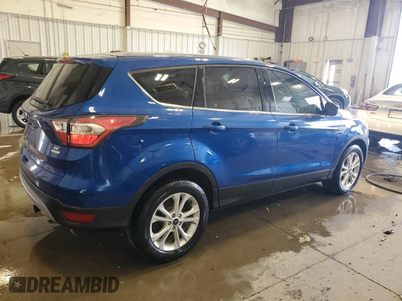 2017 Ford Escape SE z VIN 1FMCU0GD5HUB42421, wystawiony jako Copart lot #56952185 z przebiegiem 106 146 mil mil oraz Nie do naprawy • Non repairable. Historia ofert i sprzedaży dostępna na DreamBid. Obrazek 3.