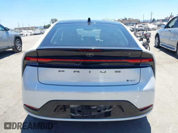 2024 Toyota Prius LE with VIN JTDACAAU2R3020703, listed as a IAAI auction lot 42644240 with 32,715 mi miles and . Bid and sale history available at DreamBid. Image 16.