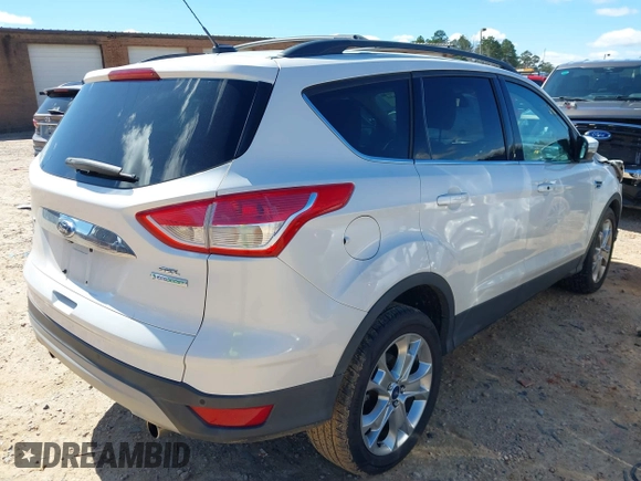 2013 Ford Escape SEL with VIN 1FMCU0HX0DUC07372, listed as a IAAI auction lot 41740884 with 96,436 mi miles and . Bid and sale history available at DreamBid. Image 4.