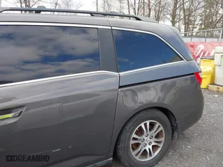 2012 Honda Odyssey EX with VIN 5FNRL5H42CB086159, listed as a IAAI auction lot 42096834 with 208,701 mi miles. Bid and sale history available at carsss.com. Image 6.