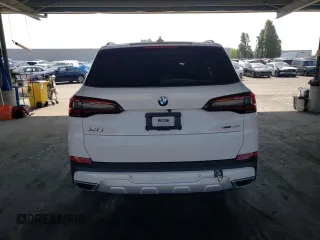 2022 BMW X5 xDrive40i z VIN 5UXCR6C0XN9L83285, wystawiony jako Copart lot #56176995 z przebiegiem 30 779 mil mil oraz Szkoda całkowita • Salvage title. Historia ofert i sprzedaży dostępna na DreamBid. Obrazek 6.