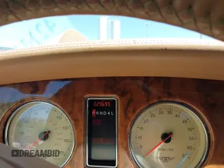 1999 Bentley Arnage z VIN SCBLB51E1XCX01401, wystawiony jako IAAI lot #42133144 z przebiegiem 29 699 mil mil oraz . Historia ofert i sprzedaży dostępna na DreamBid. Obrazek 7.