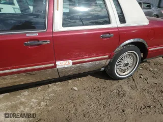 1995 Lincoln Town Car Signature with VIN 1LNLM82W2SY713693, listed as a Copart auction lot 75430484 with 156,859 mi miles and Salvage Title. Bid and sale history available at carsss.com. Image 12.