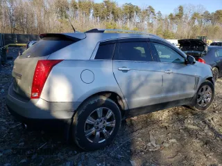 2014 Cadillac SRX Luxury Collection z VIN 3GYFNEE34ES641335, wystawiony jako Copart lot #47519325 z przebiegiem 124 407 mil mil oraz Szkoda całkowita • Salvage title. Historia ofert i sprzedaży dostępna na DreamBid. Obrazek 3.