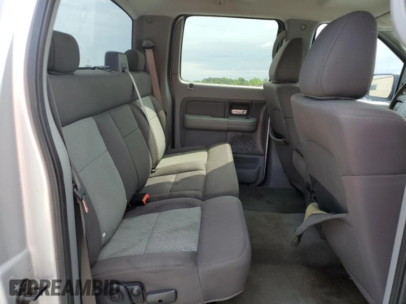 2005 Ford F-150 XLT with VIN 1FTRW12WX5FA79128, listed as a Copart auction lot 51963585 with 169,045 mi miles and Salvage Title. Bid and sale history available at carsss.com. Image 10.