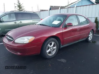 2002 Ford Taurus SE Standard z VIN 1FAFP53U32G242170, wystawiony jako IAAI lot #41299039 z przebiegiem 99 928 mil mil oraz . Historia ofert i sprzedaży dostępna na DreamBid. Obrazek 2.