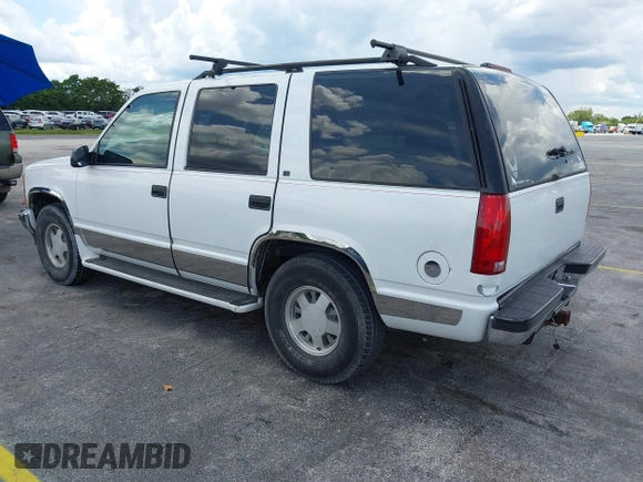 1995 Chevrolet Tahoe with VIN 1GNEC13K9SJ414611, listed as a IAAI auction lot 42798752 with 205,988 mi miles and . Bid and sale history available at DreamBid. Image 3.