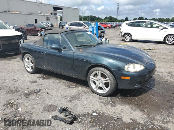 2005 Mazda MX-5 Miata LS with VIN JM1NB353X50410655, listed as a Copart auction lot 63337515 with 118,409 mi miles and Clean title. Bid and sale history available at DreamBid. Image 4.