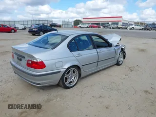 2000 BMW 3 Series 323i with VIN WBAAM3348YFP79534, listed as a IAAI auction lot 40734827 with 185,943 mi miles and . Bid and sale history available at DreamBid. Image 4.