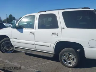 2003 Chevrolet Tahoe LT with VIN 1GNEC13Z73R168819, listed as a IAAI auction lot 41679179 with 141,164 mi miles. Bid and sale history available at carsss.com. Image 13.