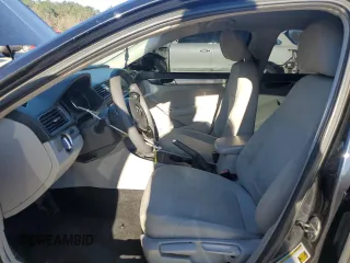 2017 Volkswagen Passat S z VIN 1VWAT7A35HC005604, wystawiony jako Copart lot #49499095 z przebiegiem 124 618 mil mil oraz Szkoda całkowita • Salvage title. Historia ofert i sprzedaży dostępna na DreamBid. Obrazek 7.