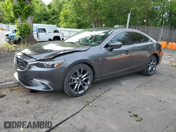 2017 Mazda 6 Grand Touring с VIN JM1GL1W55H1140064, выставлен на аукционе Copart как лот 57503425 с пробегом 74 304 миль миль и Списание • Salvage title. История ставок и продаж доступна на DreamBid. Изображение 1.