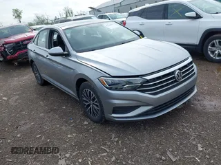 2019 Volkswagen Jetta S z VIN 3VWC57BU1KM169304, wystawiony jako IAAI lot #42124012 z przebiegiem 102 515 mil mil oraz . Historia ofert i sprzedaży dostępna na DreamBid. Obrazek 1.