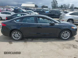 2020 Ford Fusion SE z VIN 3FA6P0LU7LR170922, wystawiony jako IAAI lot #42121025 z przebiegiem 115 799 mil mil oraz . Historia ofert i sprzedaży dostępna na DreamBid. Obrazek 13.