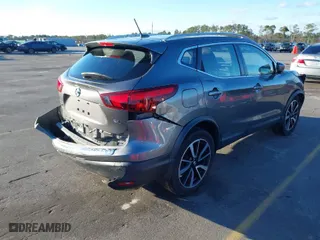 2017 Nissan Rogue Sport S with VIN JN1BJ1CP3HW018167, listed as a IAAI auction lot 41248517 with 128,684 mi miles. Bid and sale history available at carsss.com. Image 4.