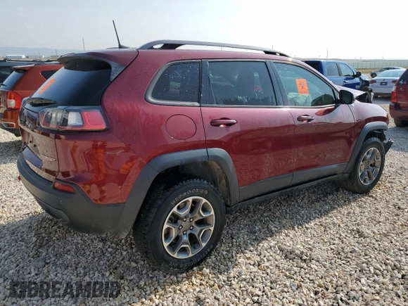 2020 Jeep Cherokee Trailhawk Elite z VIN 1C4PJMBN4LD549550, wystawiony jako Copart lot #64161064 z przebiegiem Nie podano mil oraz Szkoda całkowita • Salvage title. Historia ofert i sprzedaży dostępna na DreamBid. Obrazek 3.