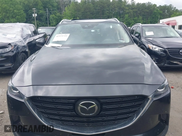 2022 Mazda CX-9 Touring Plus z VIN JM3TCBAY2N0619279, wystawiony jako IAAI lot #42373722 z przebiegiem 43 540 mil mil oraz . Historia ofert i sprzedaży dostępna na DreamBid. Obrazek 12.