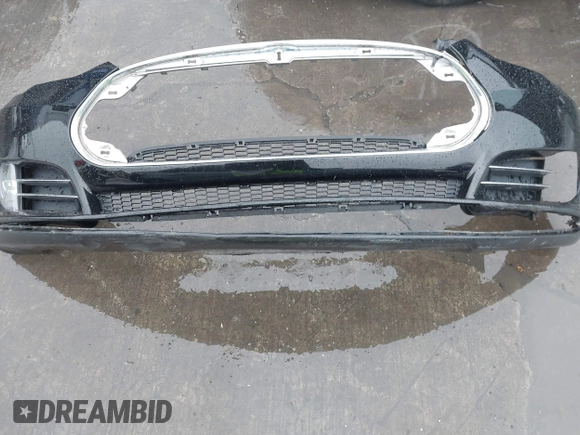 2013 Tesla Model S with VIN 5YJSA1CN0DFP20053, listed as a IAAI auction lot 41470660 with 61,568 mi miles and . Bid and sale history available at DreamBid. Image 12.
