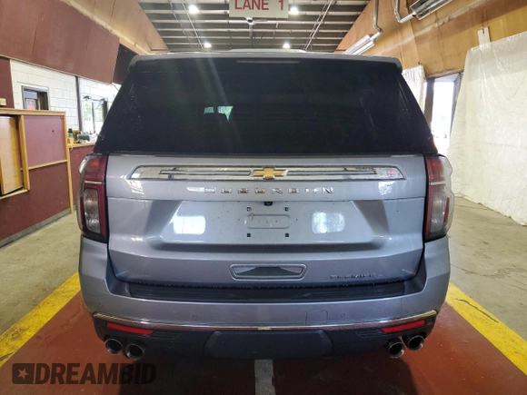 2023 Chevrolet Suburban Premier with VIN 1GNSCFKD8PR138014, listed as a Copart auction lot 65758755 with 58,501 mi miles and Clean title. Bid and sale history available at DreamBid. Image 6.