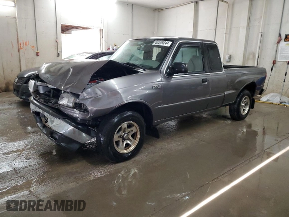 2000 Mazda B-Series 2WD Truck SE with VIN 4F4YR16V8YTM12086, listed as a Copart auction lot 82609244 with 297,354 mi miles and Salvage Title. Bid and sale history available at carsss.com. Image 1.