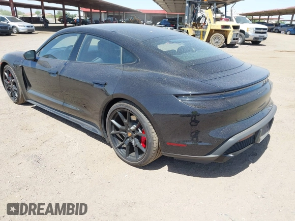 2022 Porsche Taycan GTS z VIN WP0AD2Y12NSA59275, wystawiony jako IAAI lot #42170547 z przebiegiem 43 757 mil mil oraz . Historia ofert i sprzedaży dostępna na DreamBid. Obrazek 3.