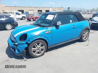 2014 MINI Convertible с VIN WMWZN3C55ET569656, выставлен на аукционе IAAI как лот 42105348 с пробегом 87 671 миль миль и . История ставок и продаж доступна на DreamBid. Изображение 2.