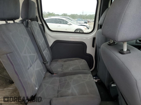 2010 Ford Transit Connect XLT with VIN NM0KS6BNXAT000034, listed as a Copart auction lot 54598985 with 133,444 mi miles and Salvage title. Bid and sale history available at DreamBid. Image 11.