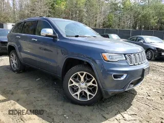 2020 Jeep Grand Cherokee Overland with VIN 1C4RJFCG7LC335839, listed as a Copart auction lot 52320505 with 86,684 mi miles and Salvage Title. Bid and sale history available at DreamBid. Image 12.