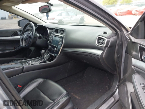 2018 Nissan Maxima SV with VIN 1N4AA6AP4JC377985, listed as a IAAI auction lot 42071678 with 104,326 mi miles and . Bid and sale history available at DreamBid. Image 5.