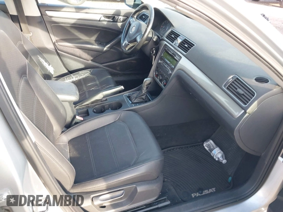 2014 Volkswagen Passat S w/Nav with VIN 1VWAP7A39EC016279, listed as a IAAI auction lot 41792113 with 189,833 mi miles. Bid and sale history available at carsss.com. Image 5.