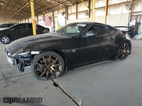 2009 Nissan 370Z z VIN JN1AZ44E19M411715, wystawiony jako Copart lot #56654815 z przebiegiem 123 791 mil mil oraz Szkoda całkowita • Salvage title. Historia ofert i sprzedaży dostępna na DreamBid. Obrazek 1.