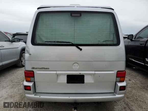 2003 Volkswagen EuroVan MV с VIN WV2NB47083H002700, выставлен на аукционе Copart как лот 76117874 с пробегом 186 942 миль миль и На запчасти • Non repairable. История ставок и продаж доступна на DreamBid. Изображение 6.