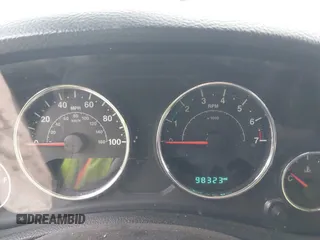 2014 Jeep Wrangler Sport with VIN 1C4AJWAG9EL312856, listed as a IAAI auction lot 42022870 with 98,323 mi miles and . Bid and sale history available at DreamBid. Image 7.