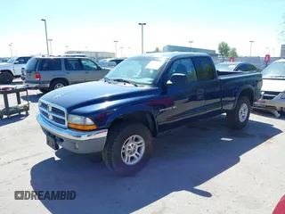 2001 Dodge Dakota Sport z VIN 1B7GG22N21S276507, wystawiony jako IAAI lot #42072844 z przebiegiem 225 874 mil mil oraz . Historia ofert i sprzedaży dostępna na DreamBid. Obrazek 2.