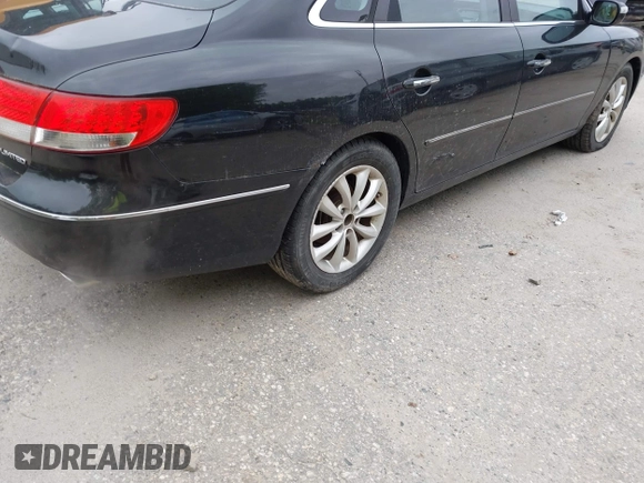 2007 Hyundai Azera SE z VIN KMHFC46F67A244191, wystawiony jako IAAI lot #42273775 z przebiegiem 178 713 mil mil oraz . Historia ofert i sprzedaży dostępna na DreamBid. Obrazek 15.