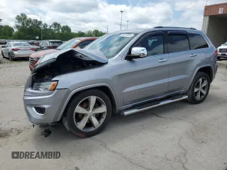 2015 Jeep Grand Cherokee Overland with VIN 1C4RJFCG8FC732898, listed as a Copart auction lot 58773505 with 153,406 mi miles and Salvage title. Bid and sale history available at DreamBid. Image 1.