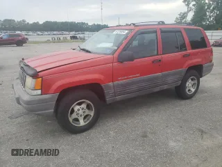 1998 Jeep Grand Cherokee Laredo with VIN 1J4FX58S3WC144684, listed as a Copart auction lot 67226694 with 106,602 mi miles and Clean Title. Bid and sale history available at carsss.com. Image 1.