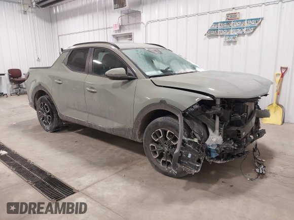 2023 Hyundai Santa Cruz SEL Premium z VIN 5NTJDDAF5PH052824, wystawiony jako IAAI lot #41599885 z przebiegiem 33 281 mil mil oraz . Historia ofert i sprzedaży dostępna na DreamBid. Obrazek 13.