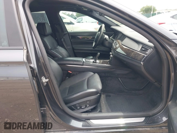 2011 BMW 7 Series 740Li with VIN WBAKB4C58BC574815, listed as a IAAI auction lot 42466704 with 155,292 mi miles and . Bid and sale history available at DreamBid. Image 5.