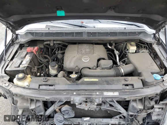 2015 Nissan Armada Platinum z VIN 5N1BA0NF6FN617932, wystawiony jako Copart lot #48202355 z przebiegiem 101 219 mil mil oraz Szkoda całkowita • Salvage title. Historia ofert i sprzedaży dostępna na DreamBid. Obrazek 12.