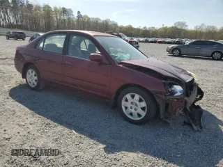 2002 Honda Civic EX with VIN 1HGES26792L063844, listed as a Copart auction lot 51217485 with 188,770 mi miles and Salvage Title. Bid and sale history available at DreamBid. Image 4.