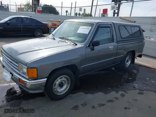 1987 Toyota Std Bed Trucks with VIN JT4RN50R0H5109089, listed as a IAAI auction lot 41403518 with 165,211 mi miles. Bid and sale history available at carsss.com. Image 18.
