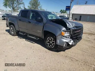 2021 GMC Canyon 4WD AT4 z VIN 1GTG6FEN1M1203936, wystawiony jako Copart lot #56041315 z przebiegiem 54 939 mil mil oraz Szkoda całkowita • Salvage title. Historia ofert i sprzedaży dostępna na DreamBid. Obrazek 13.