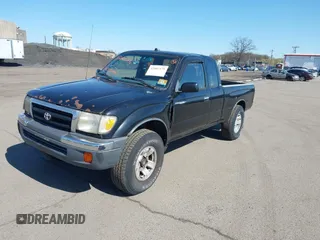 1998 Toyota Tacoma with VIN 4TAWN72N8WZ127866, listed as a IAAI auction lot 42005179 with 304,833 mi miles and . Bid and sale history available at DreamBid. Image 2.